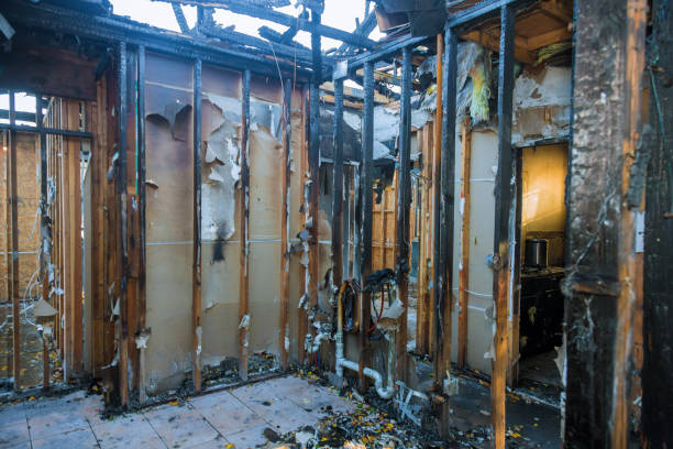 Professional Emergency Fire Damage Restoration technician working in Clinton, KY